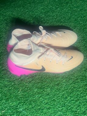 Nike Peach and Hot Pink Soccer Cleats with Black Swoosh